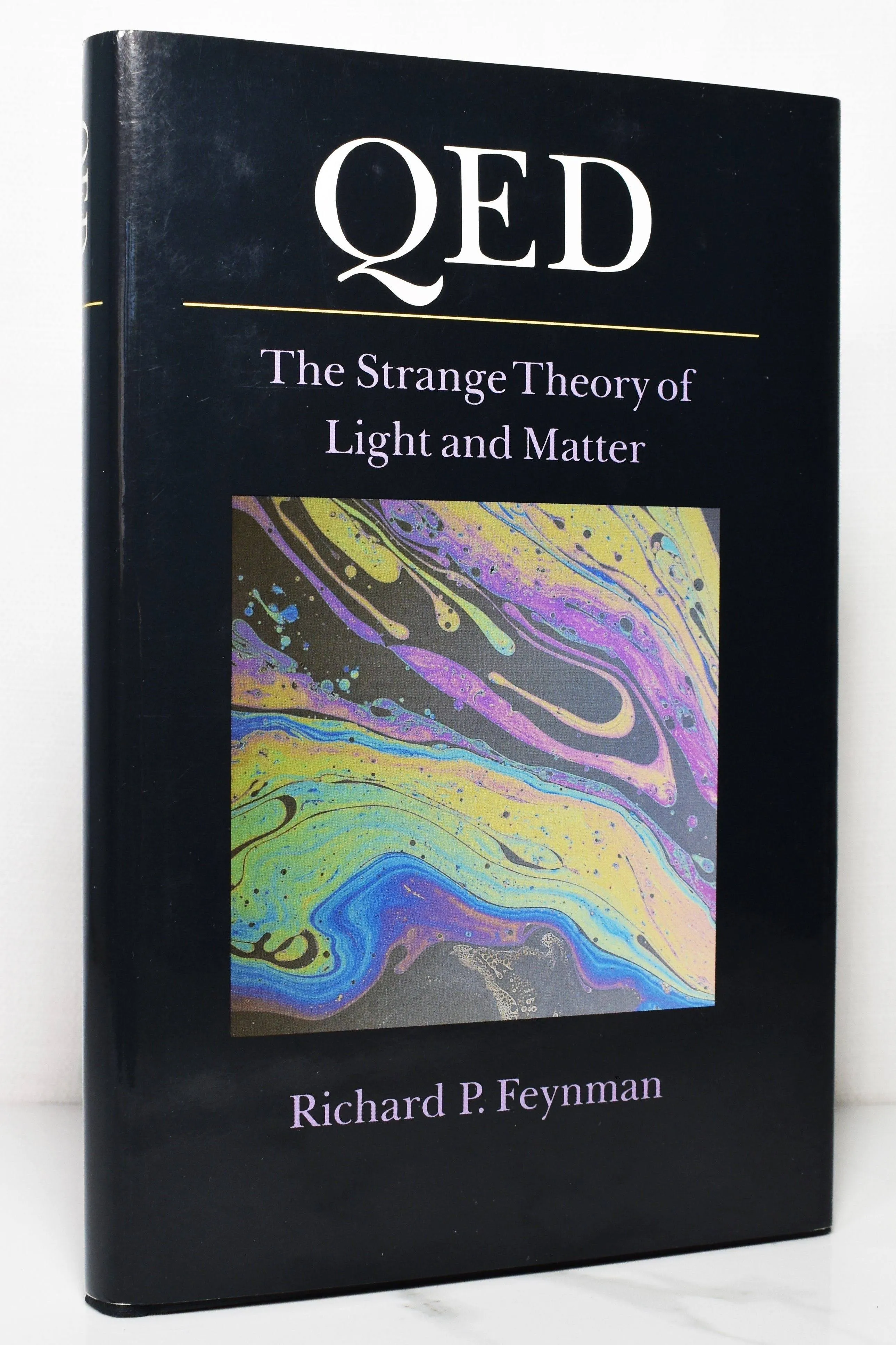 QED: The Strange Theory of Light and Matter [Book]