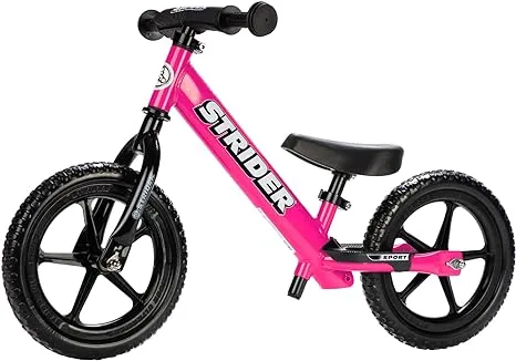 Strider 12” Sport Bike - No Pedal Balance Bicycle for Kids 1 to 4 Years - Includes Safety Pad, Padded Seat, Mini Grips & Flat-Free Tires - Tool-Free Assembly & Adjustments