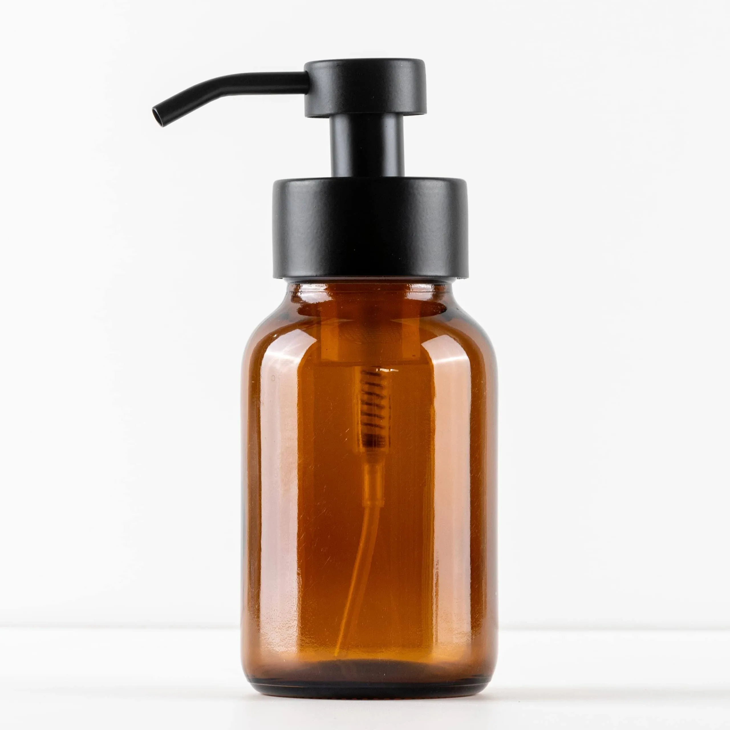 Refillable Foaming Soap Dispensing Bottle - Amber Glass - Matte Black Stainless Steel Foaming Pump - Apothecary Style for Modern bathrooms and Kitchens (Includes Labels)