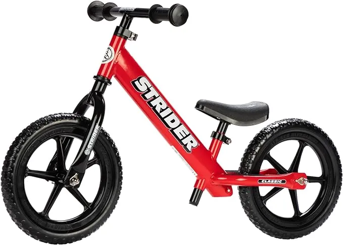 Strider 12” Classic Bike - No Pedal Balance Bicycle for Kids 1 to 3 Years - Includes Built-In Footrest, Handlebar Grips & Flat-Free Tires